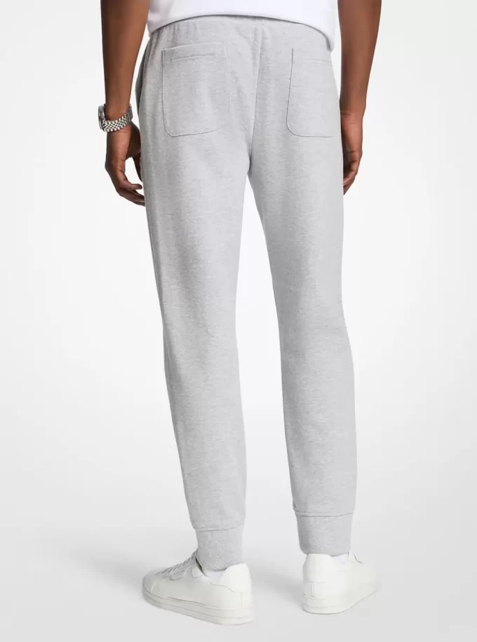 Joggers de mezcla de algodón con logotipo en relieve Joggers de mezcla de algodón con logotipo en relieve