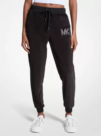 Joggers de terciopelo con logotipo adornado