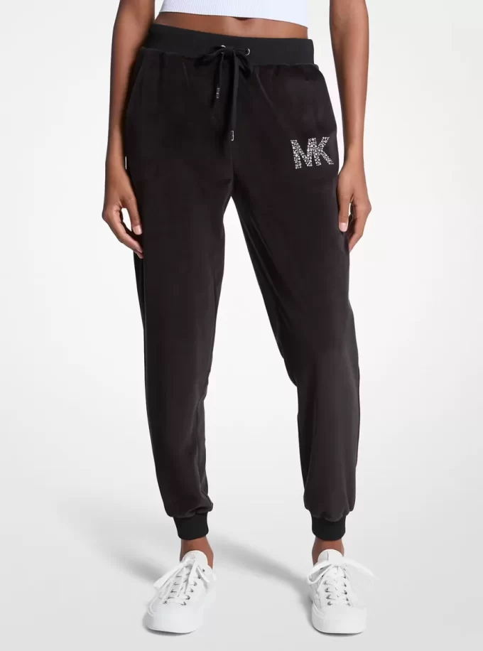 Joggers de terciopelo con logotipo adornado