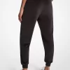 Joggers de terciopelo con logotipo adornado