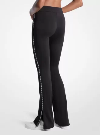 Leggings acampanados con cinta del logotipo