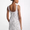 Minivestido de encaje floral con cordón y tachuelas