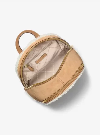 Mochila Rhea mediana de ante y borreguillo sintético