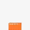 Monedero pequeño de patente para jet set Monedero pequeño de patente para jet set