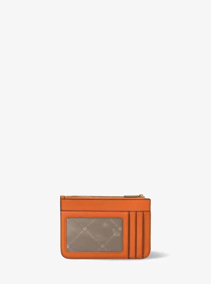 Monedero pequeño de patente para jet set Monedero pequeño de patente para jet set