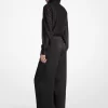 Mono con cuello de lazo de satén y jacquard con clip metálico Mono con cuello de lazo de satén y jacquard con clip metálico