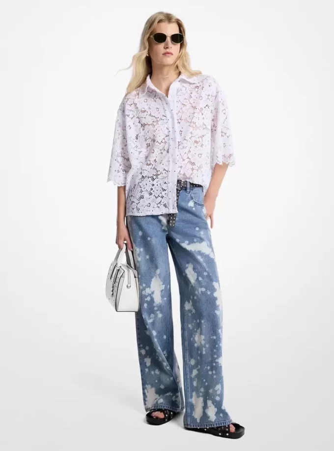 Pantalón vaquero ancho de mezclilla desteñida con salpicaduras de color a mano