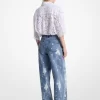Pantalón vaquero ancho de mezclilla desteñida con salpicaduras de color a mano