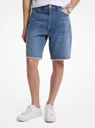 Pantalones cortos de mezclilla deshilachados