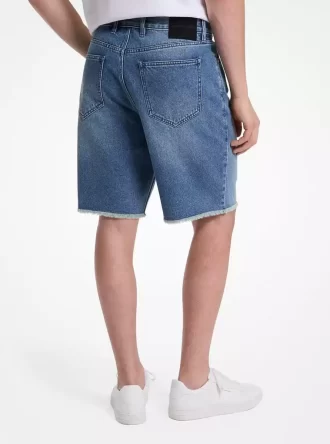 Pantalones cortos de mezclilla deshilachados
