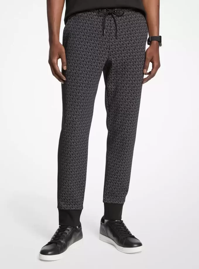 Pantalones deportivos de mezcla de algodón con estampado del logotipo de la firma Pantalones deportivos de mezcla de algodón con estampado del logotipo de la firma