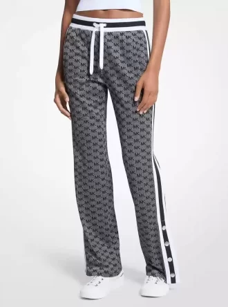 Pantalones deportivos de punto elástico metalizado con estampado de logotipo