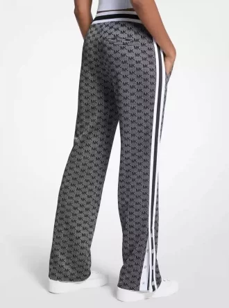 Pantalones deportivos de punto elástico metalizado con estampado de logotipo