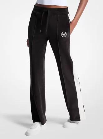 Pantalones deportivos de terciopelo a rayas