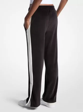 Pantalones deportivos de terciopelo a rayas