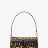 Pochette Zoe Small de pelo de becerro con estampado de leopardo Pochette Zoe Small de pelo de becerro con estampado de leopardo