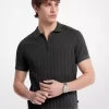 Polo de punto de algodón con cremallera Polo de punto de algodón con cremallera