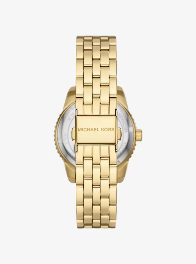 Reloj Mini Bryant con logotipo pavé en tono dorado