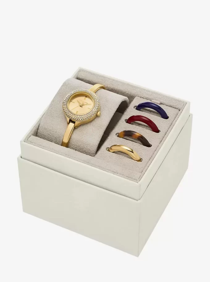Reloj Mini Izzy Pavé en tono dorado y juego de biseles intercambiables Reloj Mini Izzy Pavé en tono dorado y juego de biseles intercambiables
