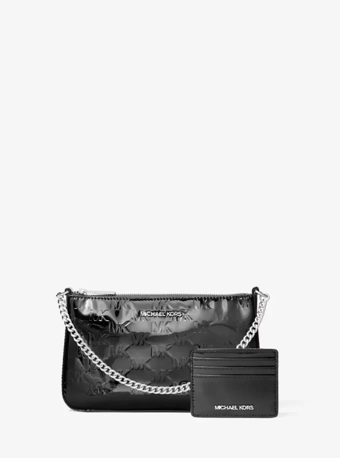 Set de regalo con estuche y cartera con el logotipo de la patente Jet Set grabado. Set de regalo con estuche y cartera con el logotipo de la patente Jet Set grabado.