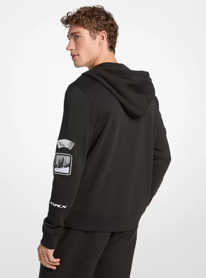 Sudadera con capucha y cremallera de algodón adornada