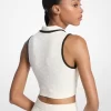 Top corto técnico de punto jacquard con logo