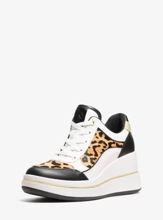 Zapatillas de cuña Emmy de piel y pelo de becerro con estampado de leopardo