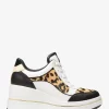 Zapatillas de cuña Emmy de piel y pelo de becerro con estampado de leopardo Zapatillas de cuña Emmy de piel y pelo de becerro con estampado de leopardo