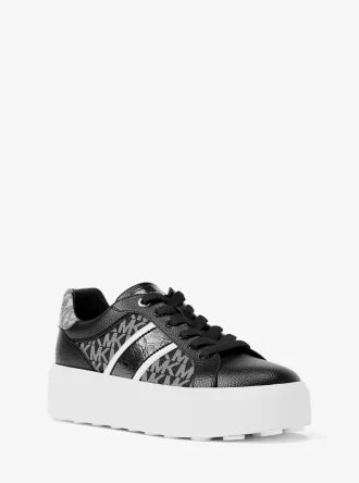 Zapatillas de plataforma con rayas y logo de la firma Romey