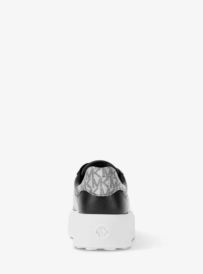 Zapatillas de plataforma con rayas y logo de la firma Romey Zapatillas de plataforma con rayas y logo de la firma Romey